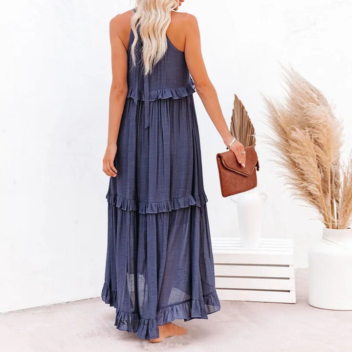 Clara™ - Sunshine breeze maxikjole med halterneck og flæser og lommer